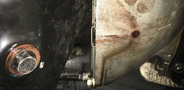 Why is Transmission Fluid Leaking from Bell Housing