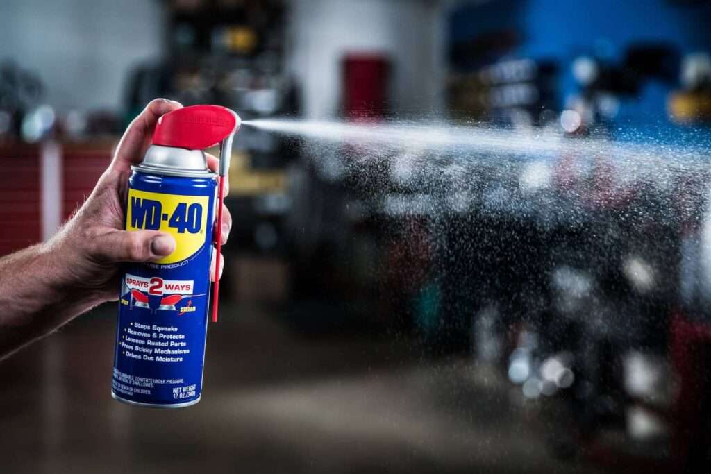 Spray a bit of WD-40 on the tar spot